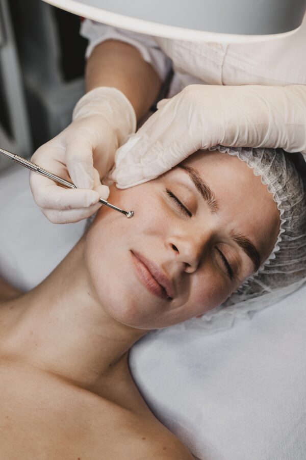 woman-getting-skincare-procedure-wellness-center